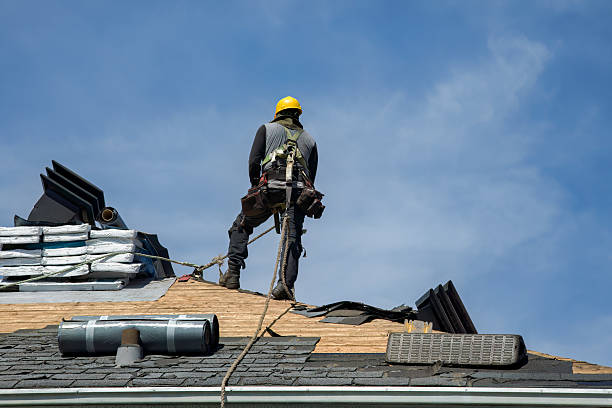 Professional Storm Damage Roof Repair technician working in Okarche, OK